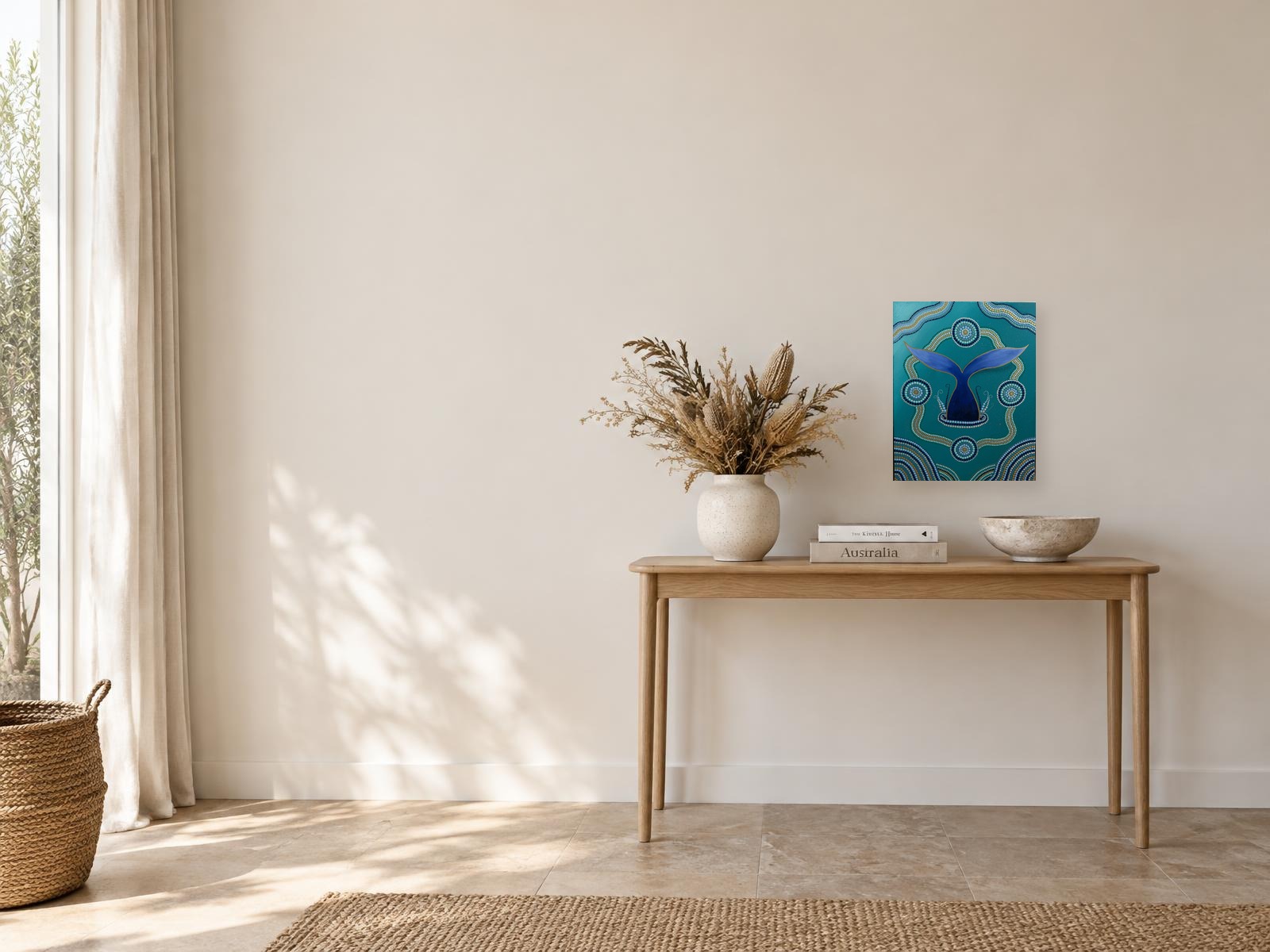 Digital room mockup showing the whale tail painting above a console table in a coastal entryway